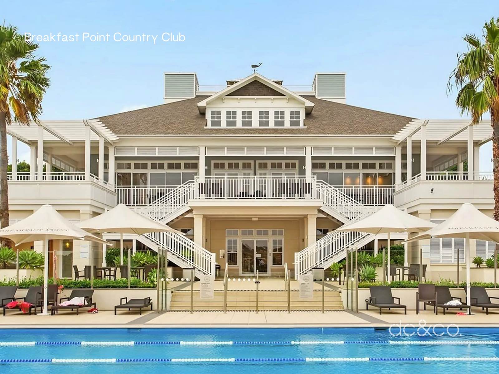 The Breakfast Point Country Club clubhouse above the 25-metre lap pool